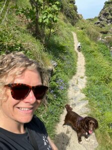 dogs walking with me along a riverside walk
