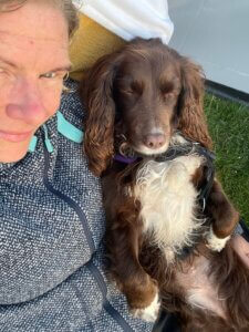 Envy relaxing with me at the campsite 